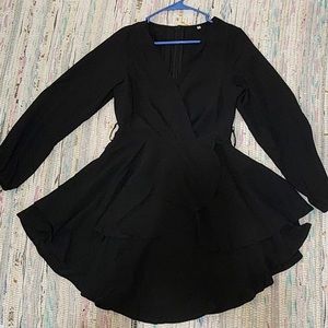 Black casual dress, in a size small it’s very flattering.